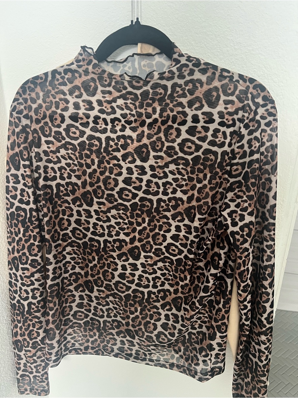 Leopard Animal mesh/see through material size L (stretchy)
